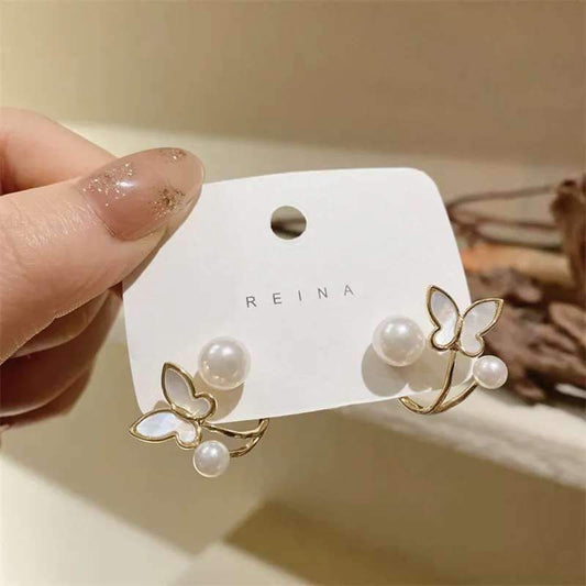 Butterfly pearl earring